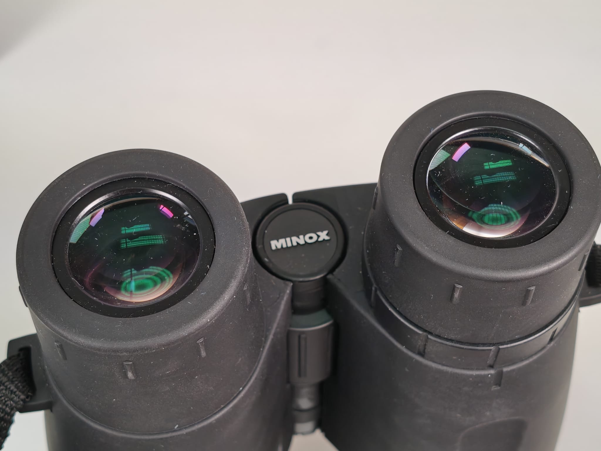Minox BD 10x58 ED inkl. Riemen und Tasche